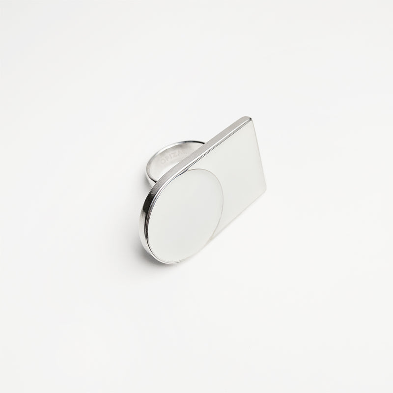 Silver ring with white enamel