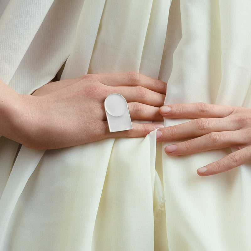 Silver ring with white enamel