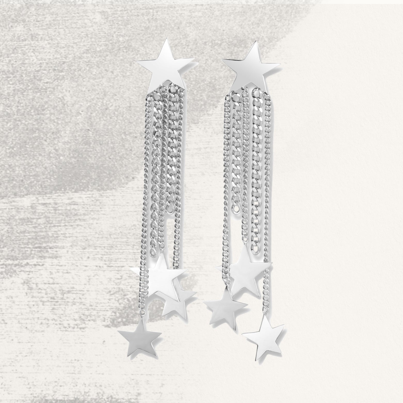 Earrings of sterling silver stars and chains