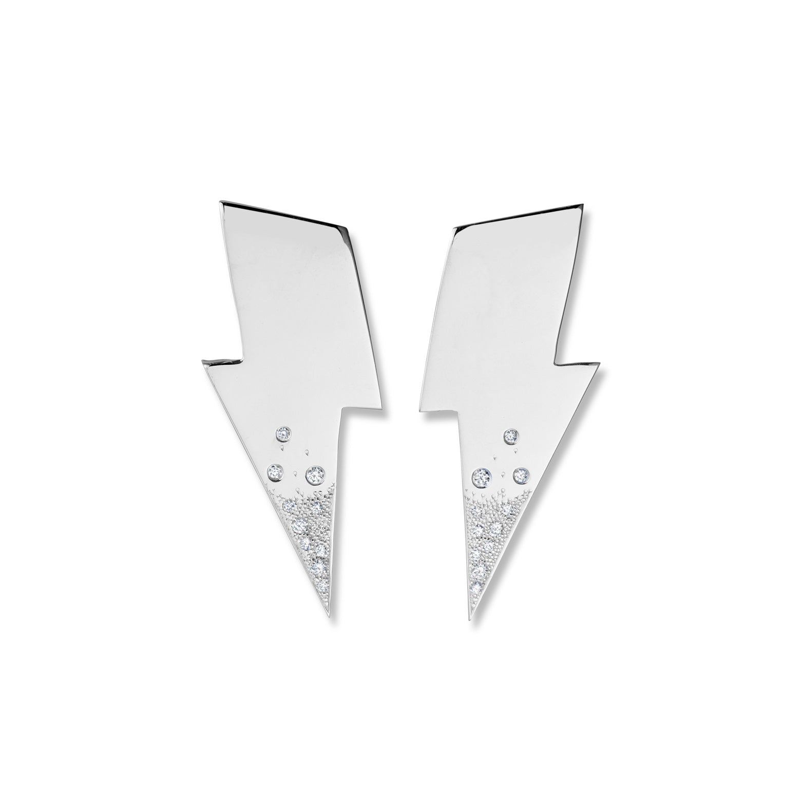 Kelly Woodcroft handcrafted lightening bolt shaped earrings in sterling silver feature a spattering of small diamonds.